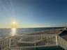Gulf views overlooking a walkable sandy beach.