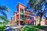 Two story townhome is highlights from the promenade on the waterfront