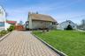 Front With Paved Driveway