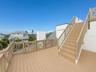 Lower Roof Top Deck and stairs to upper rooftop deck.