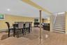 Comfortable family room provides valuable additional living space with flexibility for entertaining or everyday use.