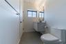 Half bathroom with vanity and toilet