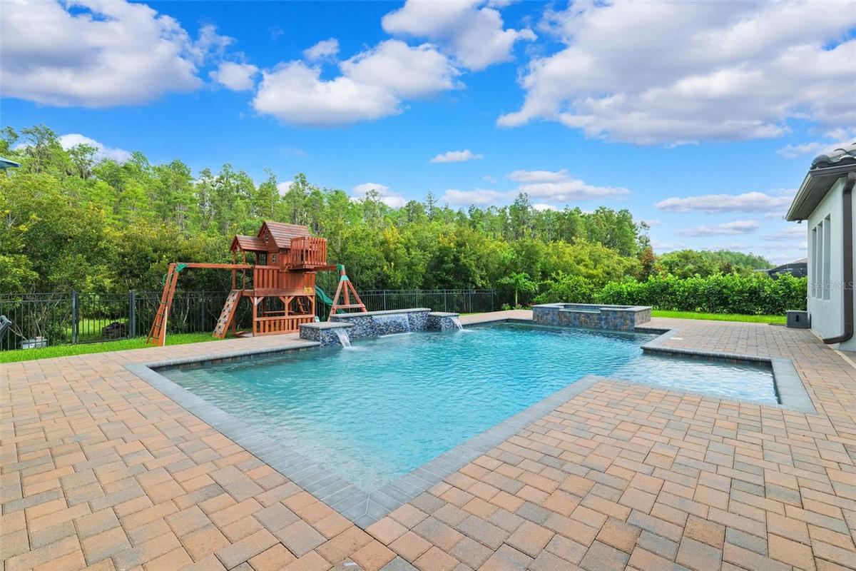 Privacy with resort style pool and plenty of space for backyard fun.