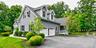 2 car garage and ample parking. Side entrance to with legal accessory apartment
