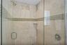 Main floor primary bedroom walk-in shower