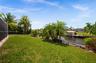 Back yard has lots of space and waterfront views