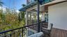 Private balcony surrounded by tropical greenery