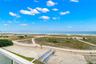 delivers an immersive beachfront experience with unobstructed Gulf views from its spacious private balcony, placing you directly above the sand with n