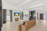 Elongated windows, gas fireplace and wet bar