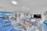 Open concept Living room with Double Sliding Hurricane Impact doors