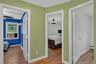 Main-level hallway provides easy access to all three bedrooms and the full bathroom.