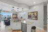 High ceilings and plantation shutters throughout add to the charm of the home!