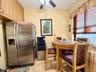 Eat in kitchen area, with large window in the corner of the building, great for ventilation