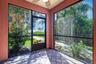 Screened lanai/porch located off the breakfast noon and kitchen areas