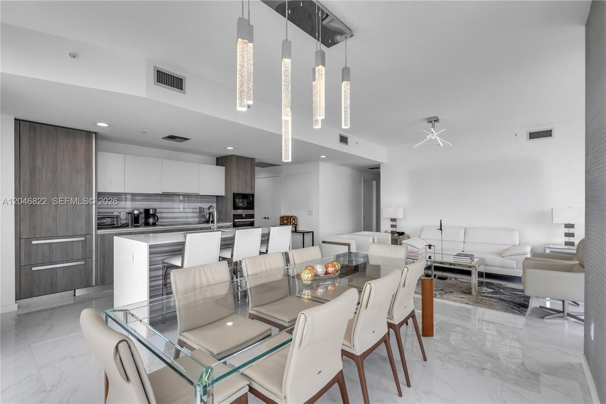 Second living area with abundant light and skyline outlook
