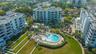 Aerial view of building and pool