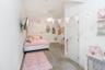 Spacious bedroom with plenty of space for queen sized bed and large walk in closet.