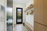 Mudroom with light wood finished floors