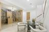 Wine room with recessed lighting and tile patterned flooring