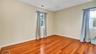 Unfurnished room with light wood-style flooring, baseboards, and visible vents