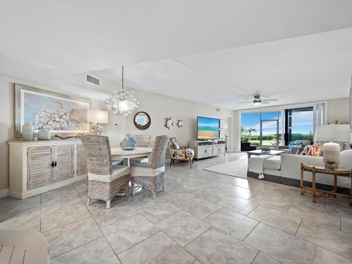 This meticulously kept home is open and beautifully turn-key furnished with a gorgeous view to the Gulf of Mexico