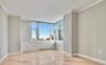 Spare room with baseboards and ornamental molding