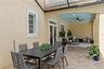 Large lanai with multiple gathering spaces