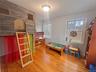 Game room featuring light wood finished floors and baseboards