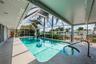Most living spaces overlook the pool
