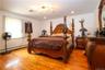 Primary bedroom that hosts a king size bed