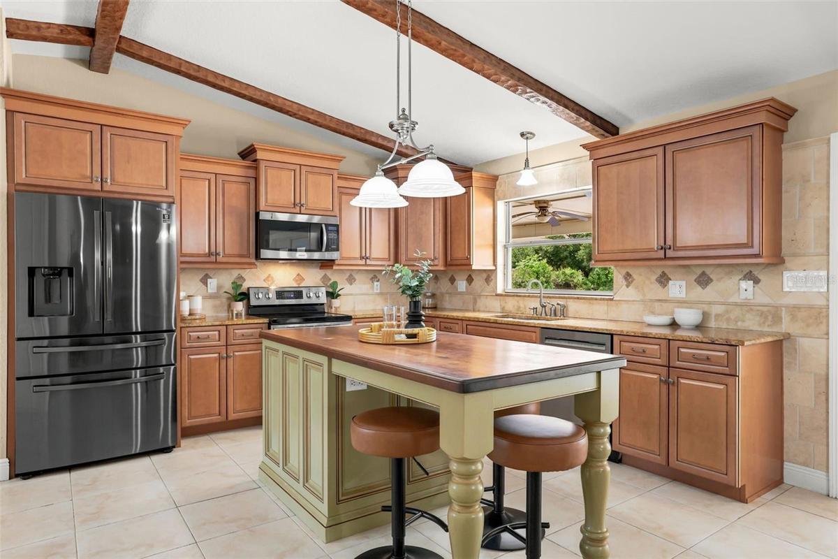 At the heart of the home, the STUNNING KITCHEN is designed for both everyday living and hosting with ease.