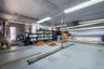 the office is located behind the shelves
