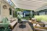 Retractable awning makes your deck like a private courtyard in all seasons and all types of weather