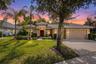 Welcome to this custom-built Grey Hawk at Lake Polo home, perfectly positioned on a quiet cul-de-sac with protected conservation views, exceptional pr