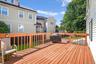 Wooden terrace with a yard