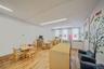 Recreation room featuring light wood finished floors and baseboards