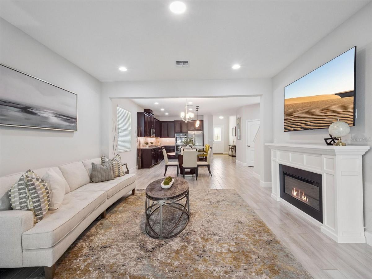 Living Room to Dining + Kitchen