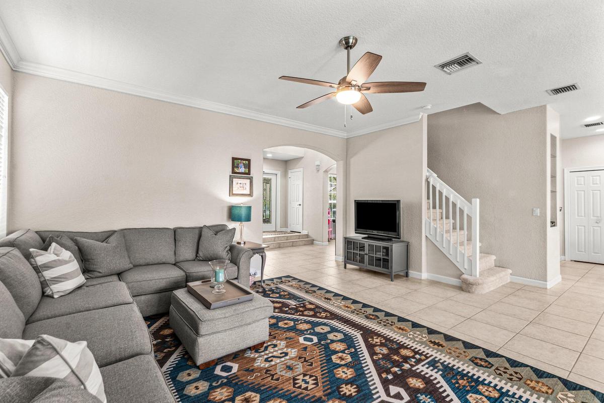 Family Room to Entry: Stairs ~ 8215 Calt