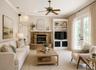 Virtually staged family room with fireplace & French doors onto patio