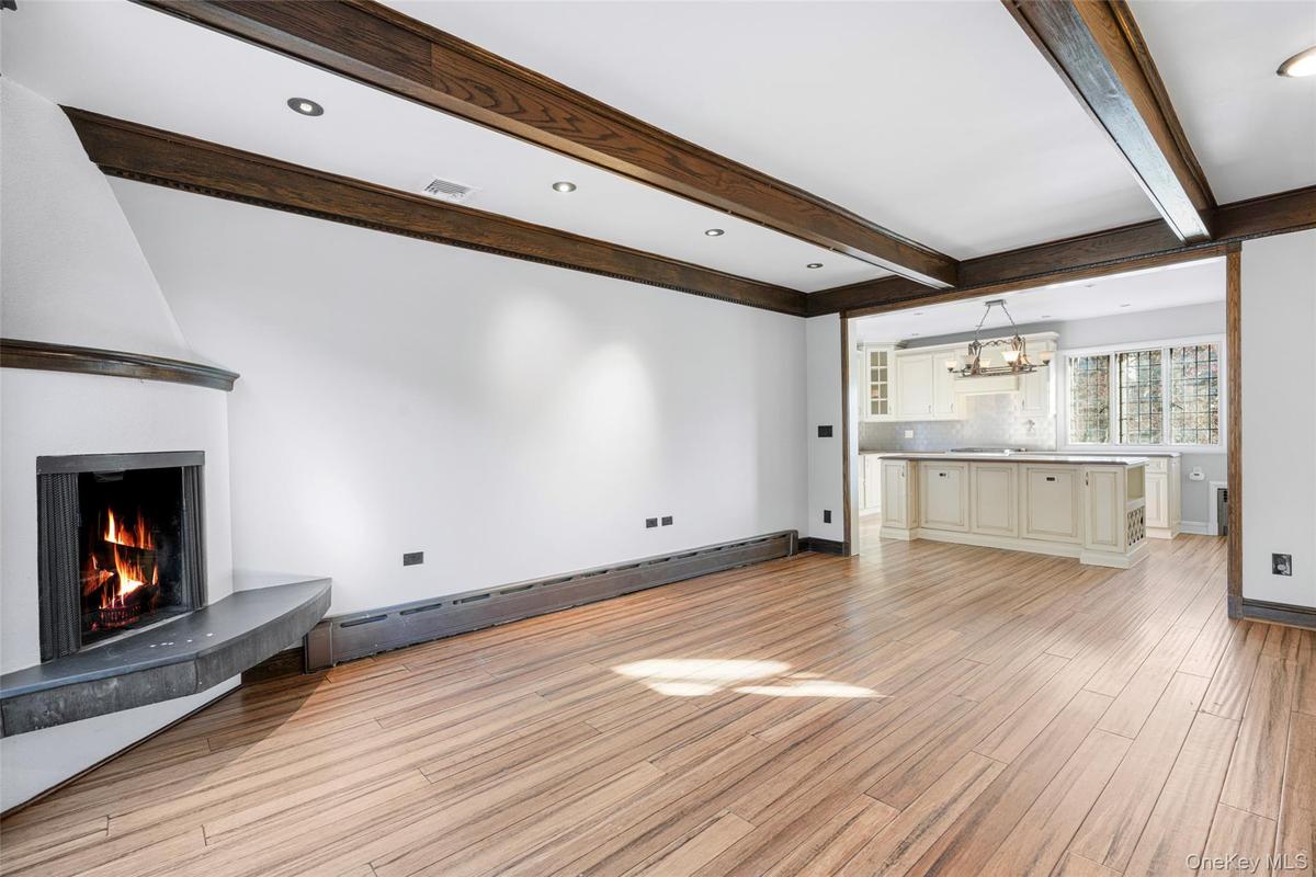 Family room with adjacent eat in kitchen.