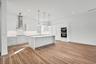 A chef's dream! Bright, open, kitchen with Miele and Samsung appliances.