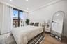 Bedroom with light wood-style flooring and recessed lighting