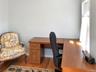 Office with light wood finished floors and baseboards
