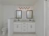 The primary bathroom provides the owners with a spa like experience