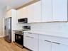 new cabinetry, and stainless steel appliances