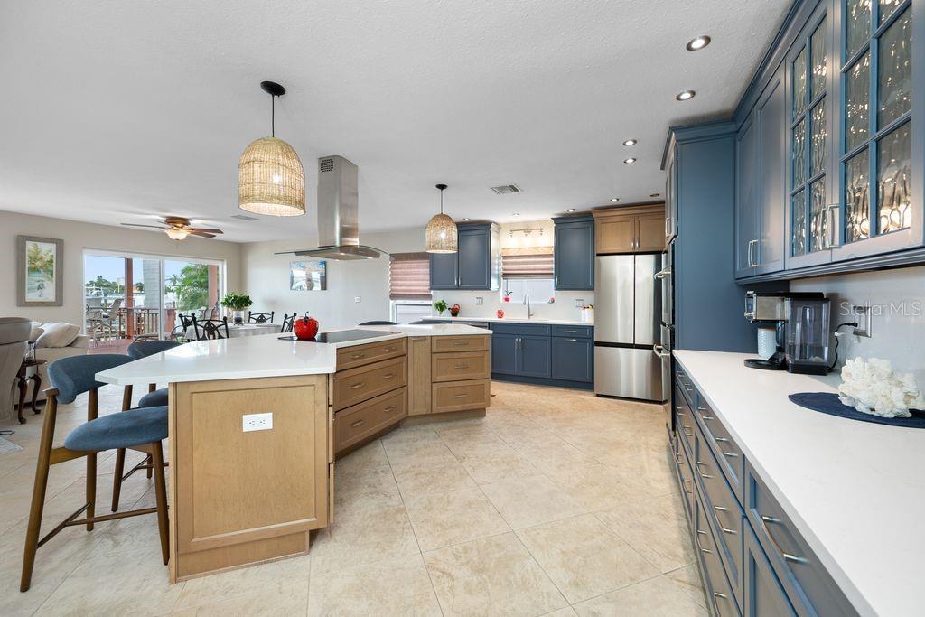 Beautiful two tone coastal kitchen - Cabinets by Medallion