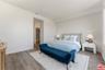 Bedroom featuring wood-style f