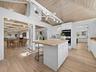Convenient and mostly open to the dining area, the kitchen was designed to be able to easily close it off for those more formal occassions.