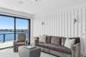 Living room featuring a water view