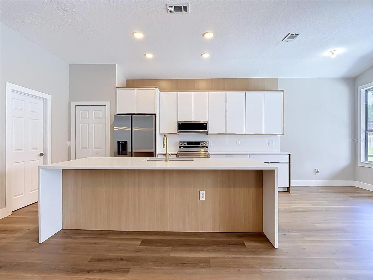 fully renovated kitchen with quartz countertops